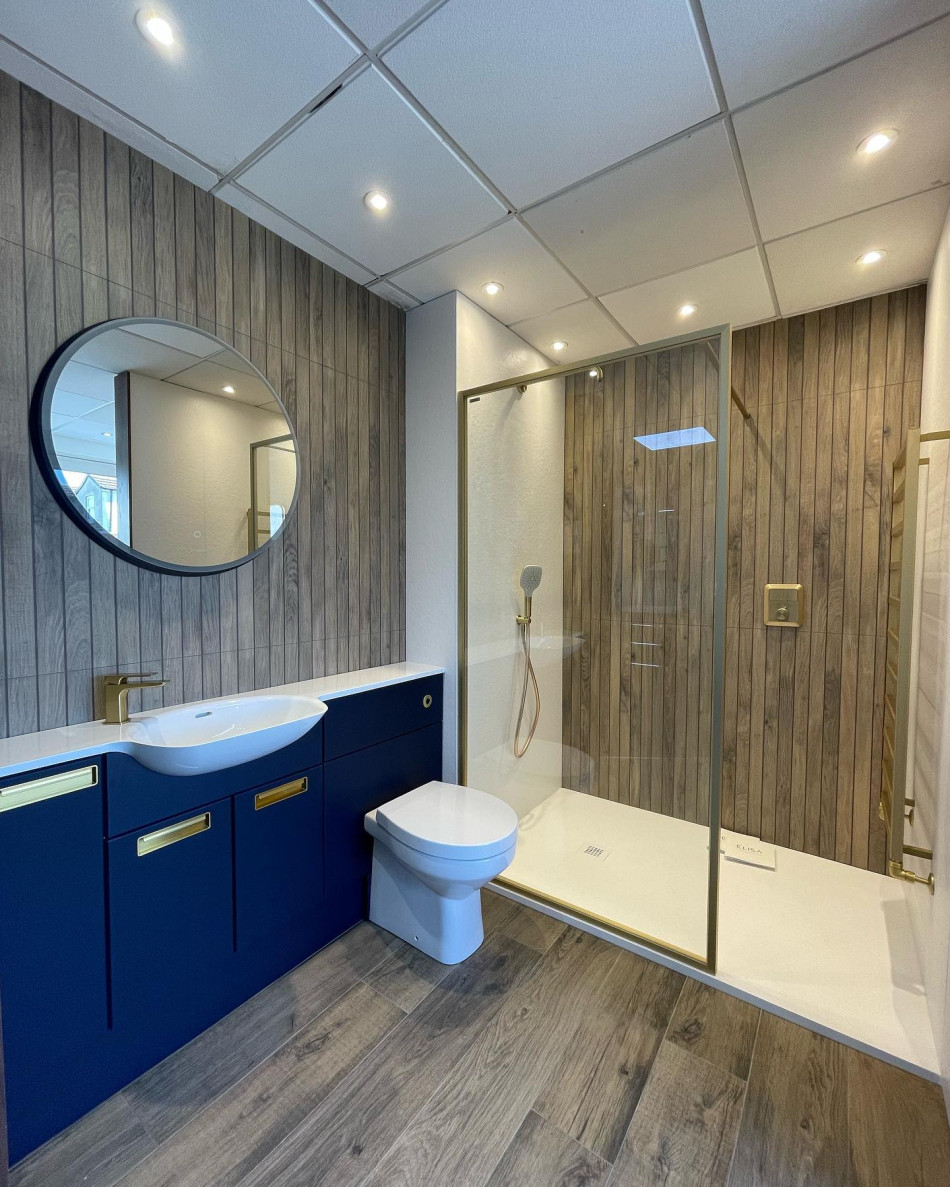 Wet-room-shower-enclosure-and-fitted-unit-with-basin-and-back-to-wall-pan