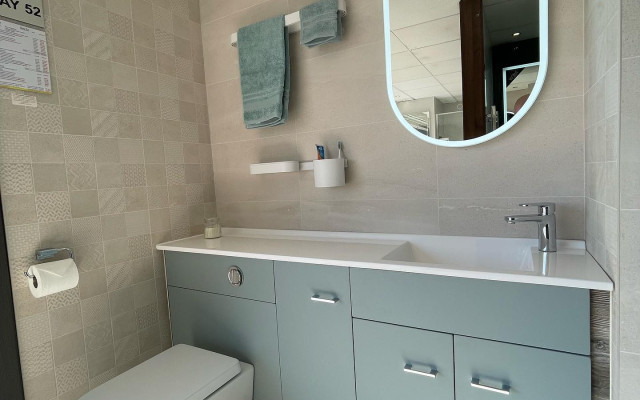 Fitted Furniture Unit With Basin And Back To Wall Pan